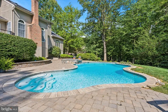 a view of a house with swimming pool