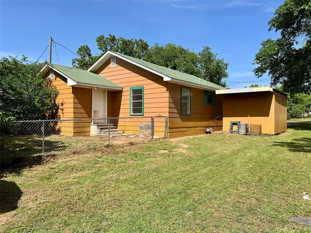 a front view of house with yard