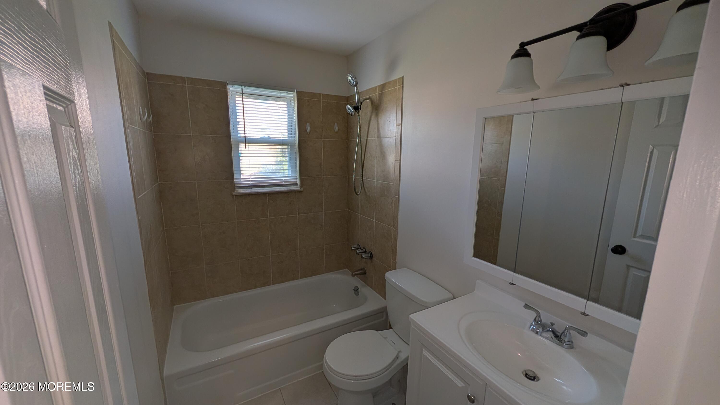 230 Sawmill Road, Unit A Brick, NJ 08724 - Photo 12 of 21 a bathroom with a sink toilet and shower