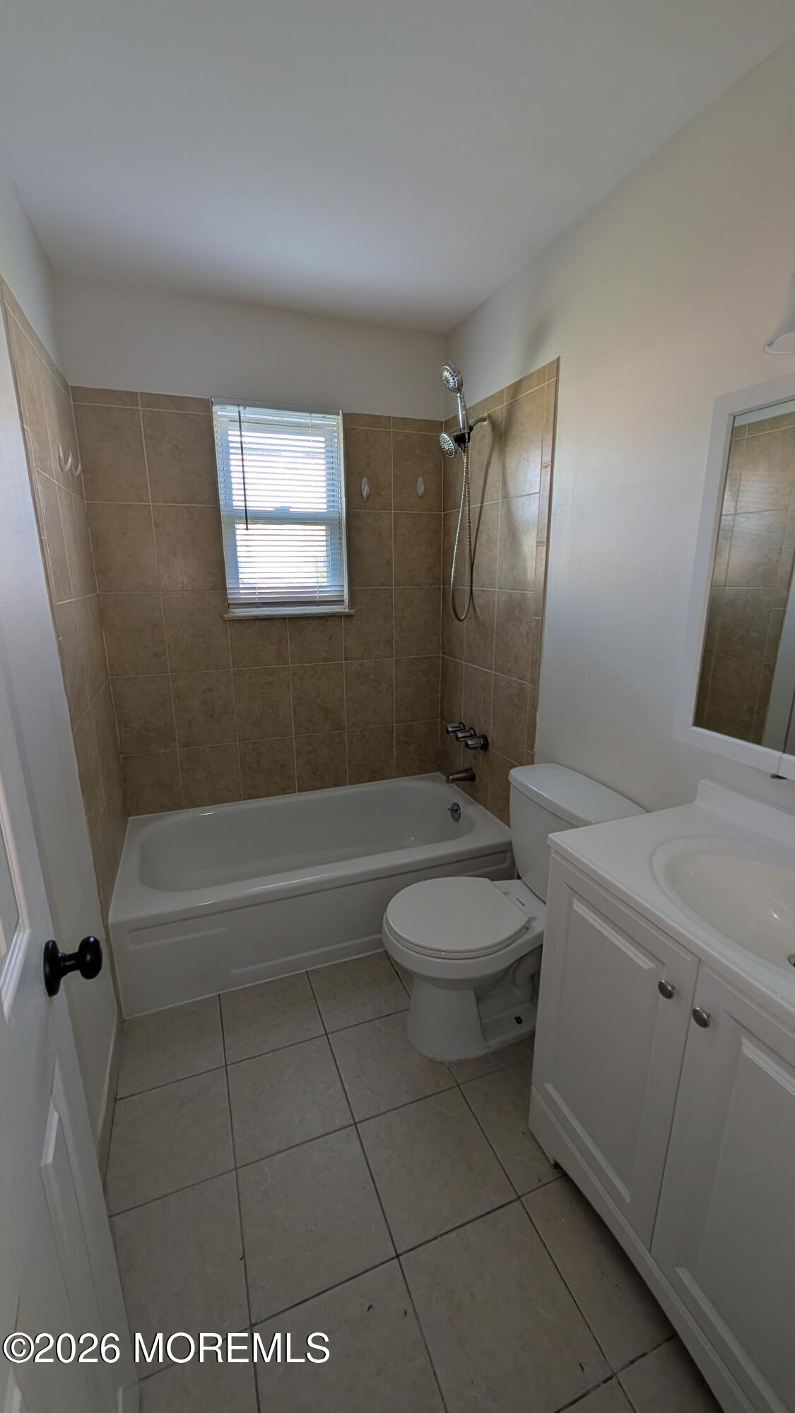 230 Sawmill Road, Unit A Brick, NJ 08724 - Photo 14 of 21 a bathroom with a toilet a sink and bathtub