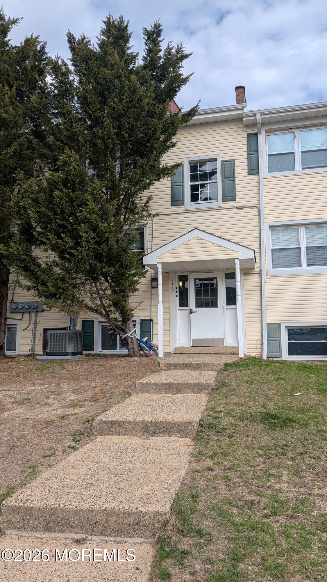 230 Sawmill Road, Unit A Brick, NJ 08724 - Photo 21 of 21 a front view of a house with a yard