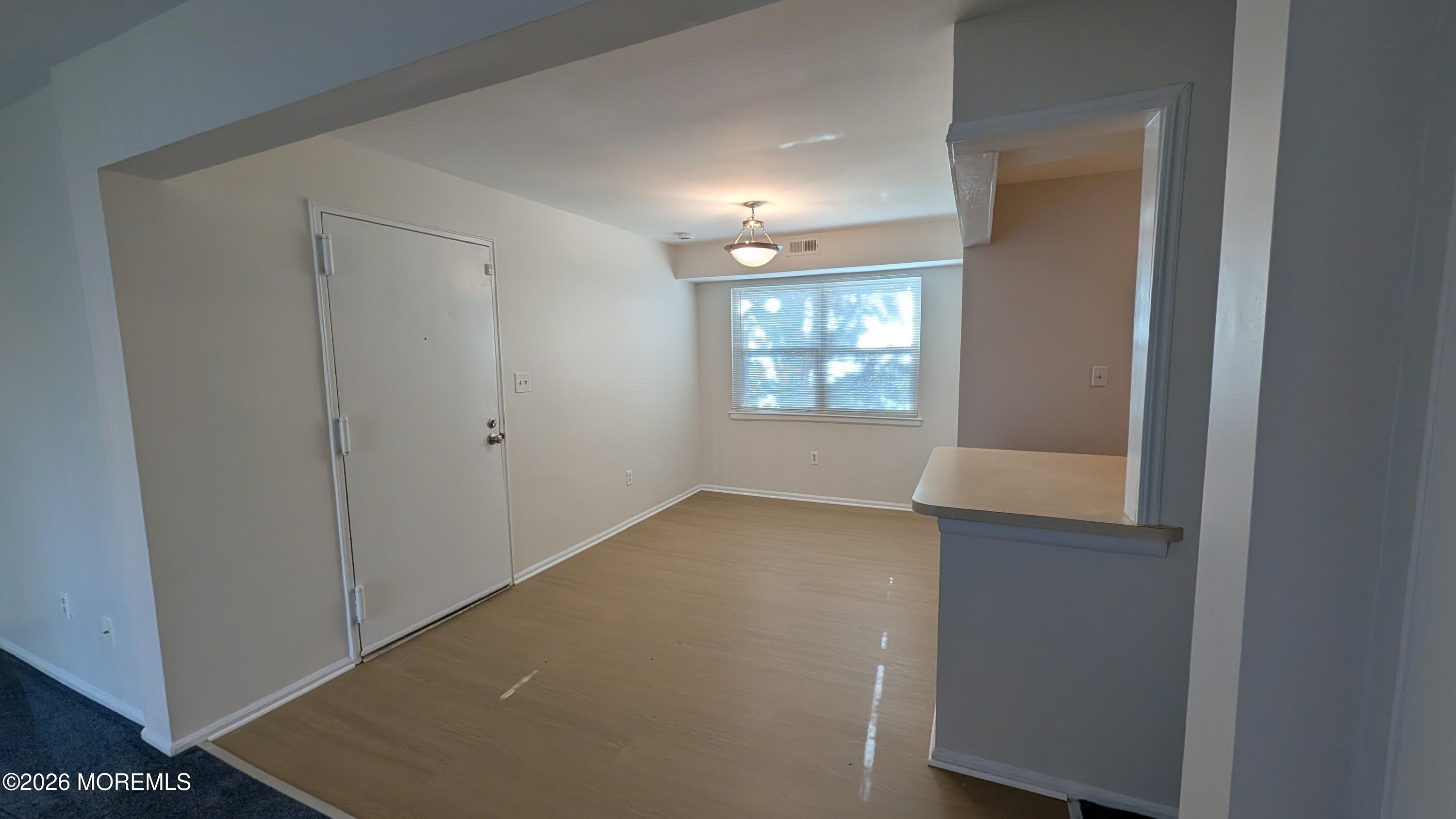 230 Sawmill Road, Unit A Brick, NJ 08724 - Photo 4 of 21 New Floor in Dining Room