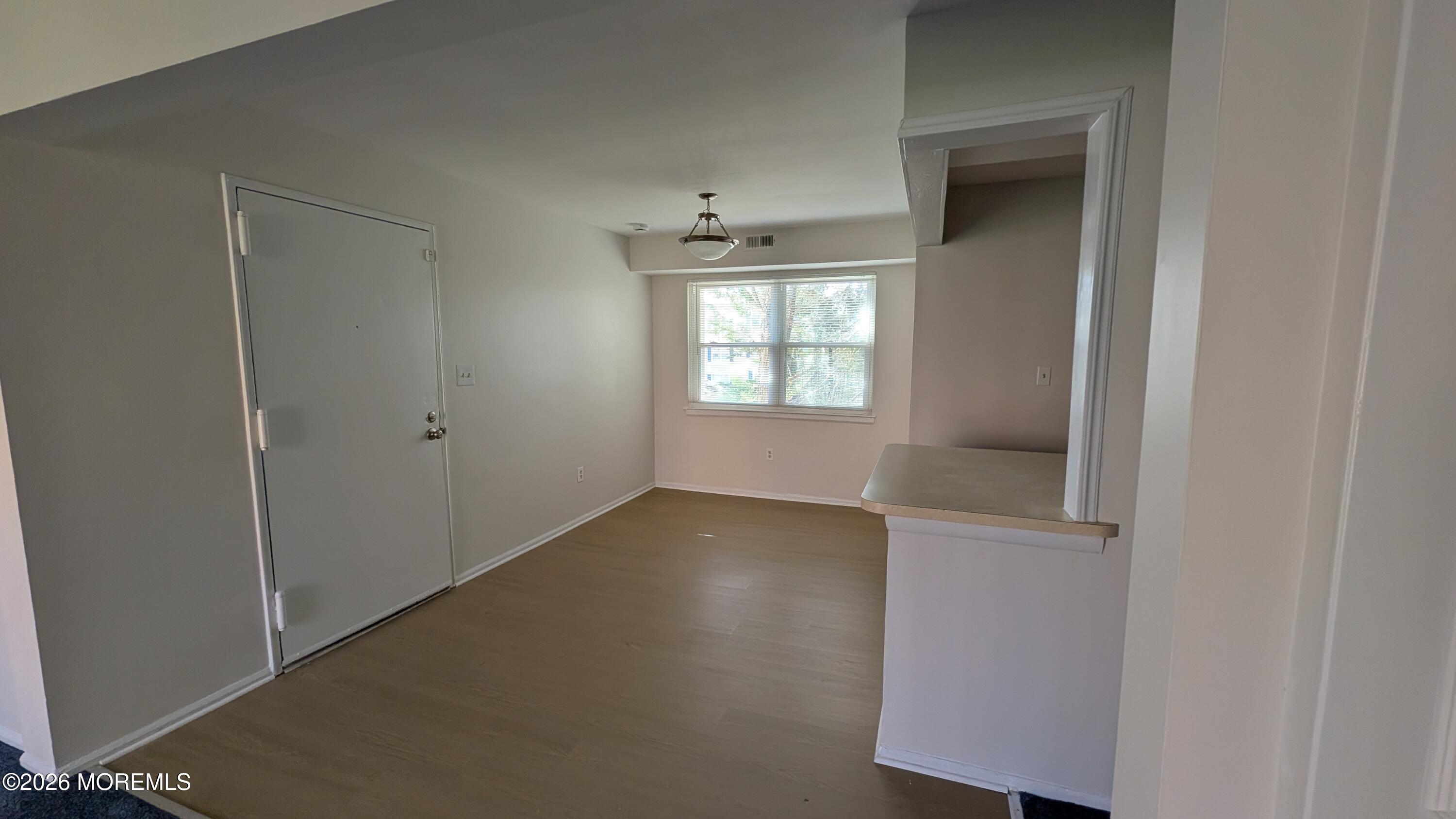 230 Sawmill Road, Unit A Brick, NJ 08724 - Photo 5 of 21 an empty room with windows and closet