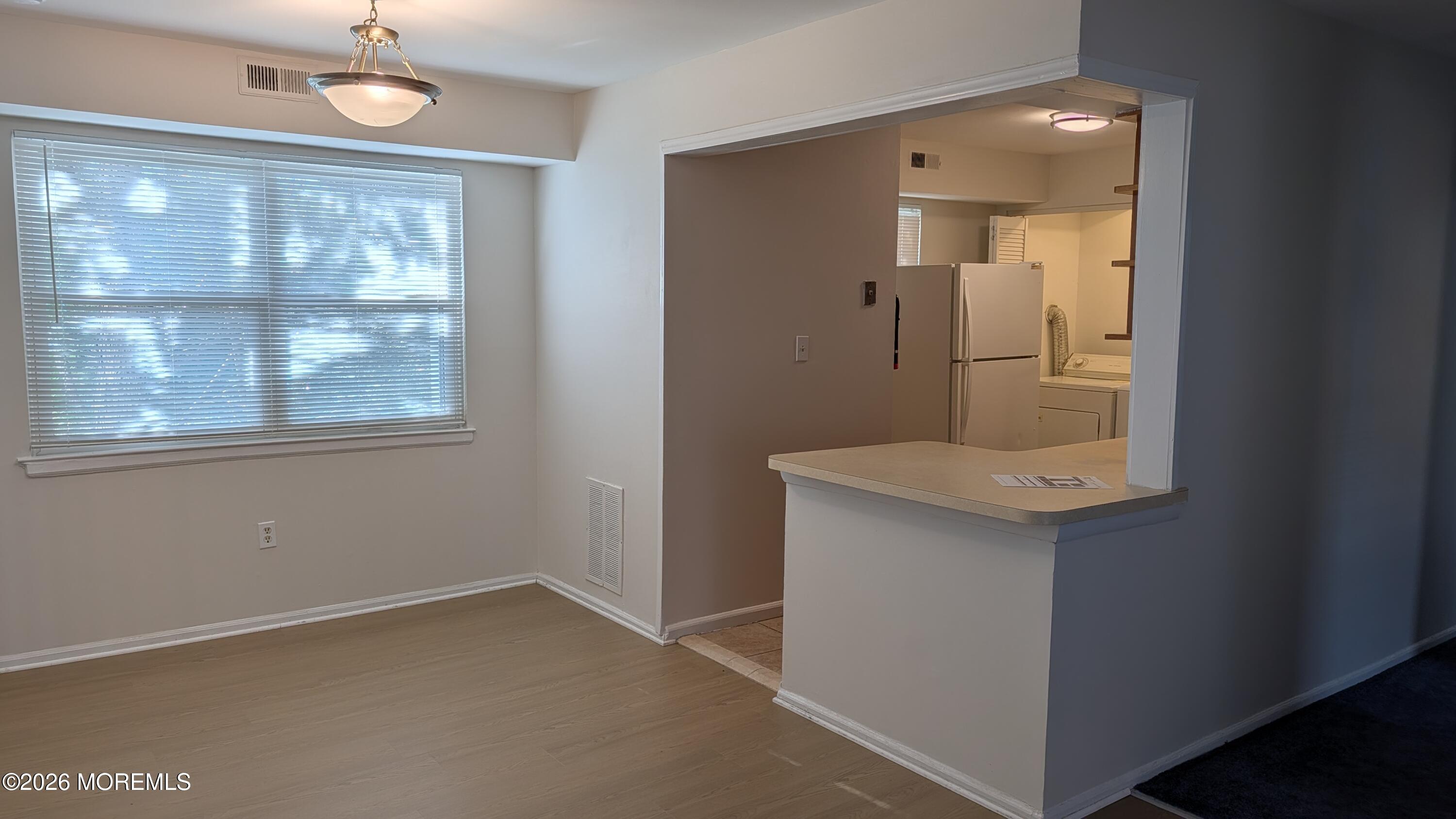 230 Sawmill Road, Unit A Brick, NJ 08724 - Photo 5 of 21 New Floor in Dining Room
