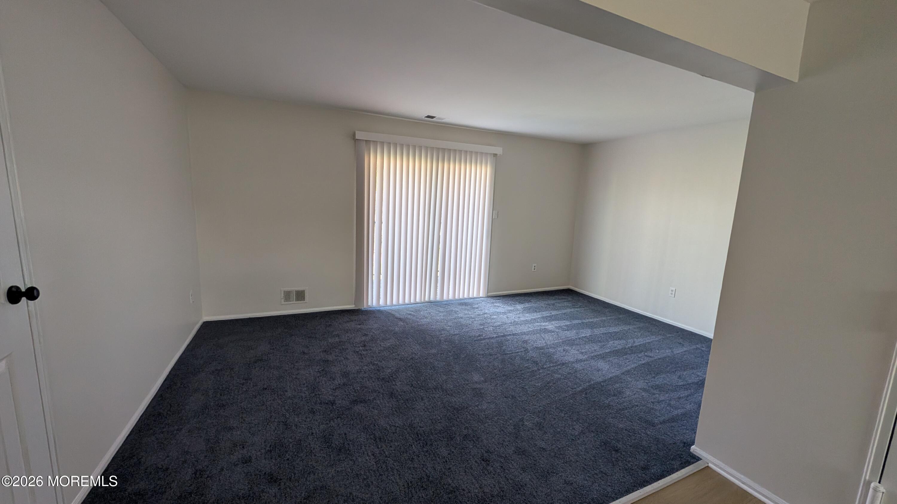 230 Sawmill Road, Unit A Brick, NJ 08724 - Photo 7 of 21 an empty room with windows
