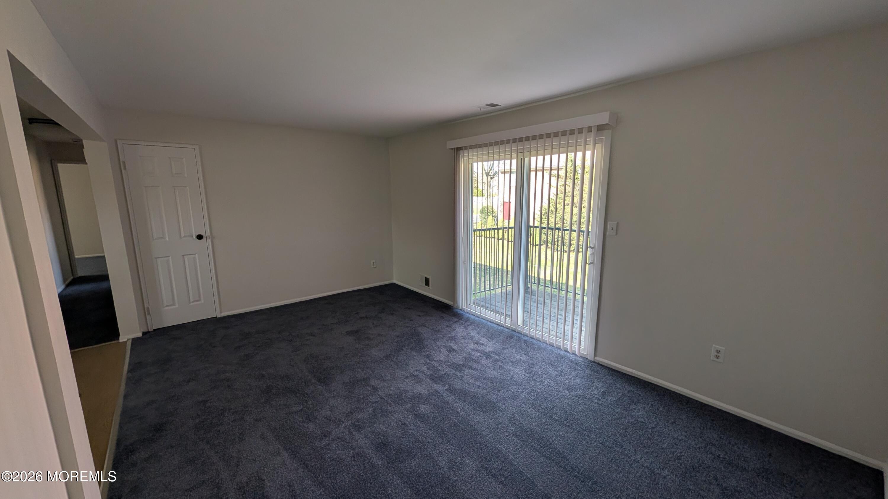 230 Sawmill Road, Unit A Brick, NJ 08724 - Photo 9 of 21 an empty room with windows