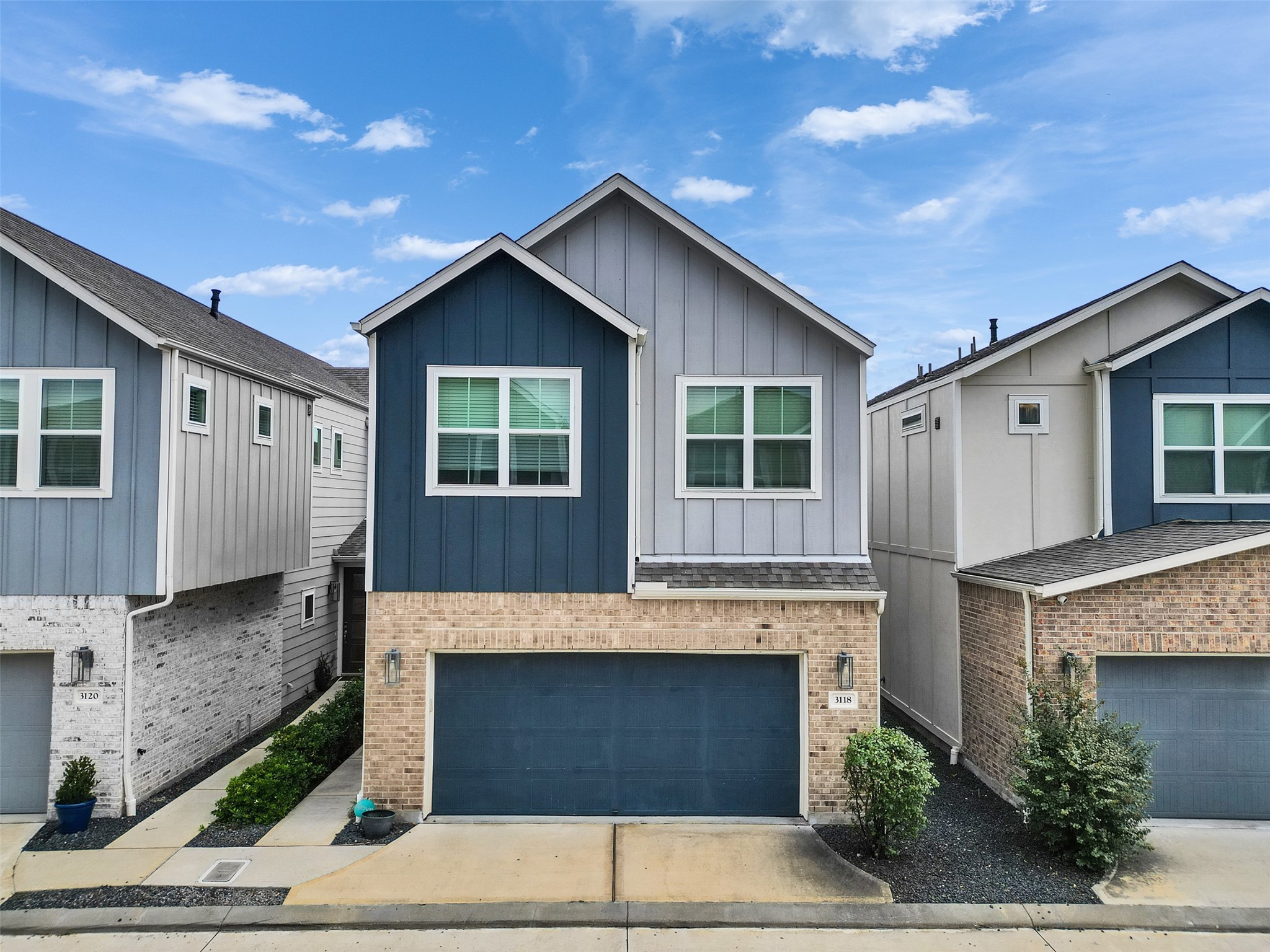 3118 Cloud Forest Lane Houston, TX 77080 - Photo 1 of 40 a front view of a house with garage