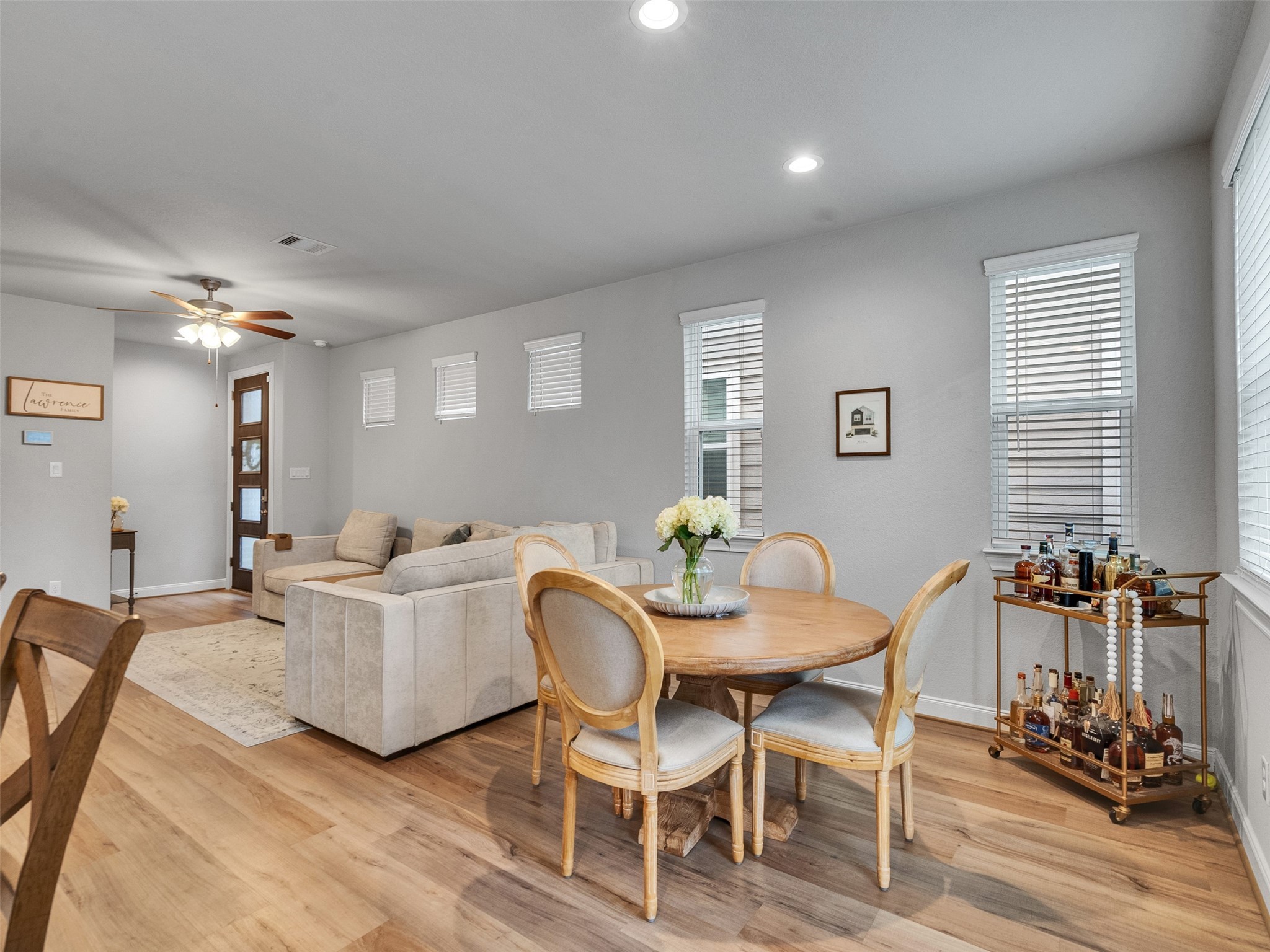 3118 Cloud Forest Lane Houston, TX 77080 - Photo 13 of 40 a view of a dining room with furniture and wooden floor