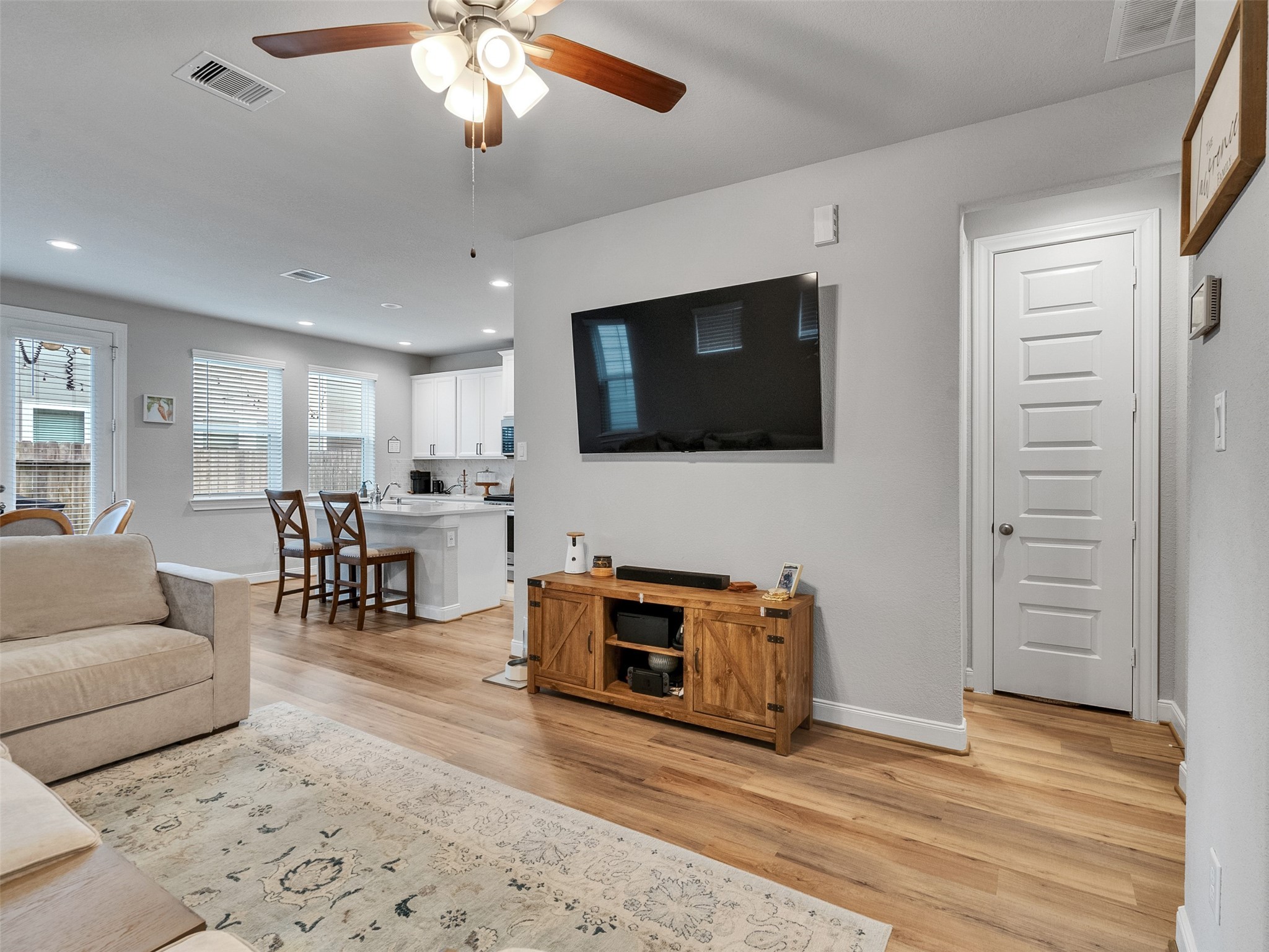 3118 Cloud Forest Lane Houston, TX 77080 - Photo 17 of 40 a living room with furniture and a flat screen tv