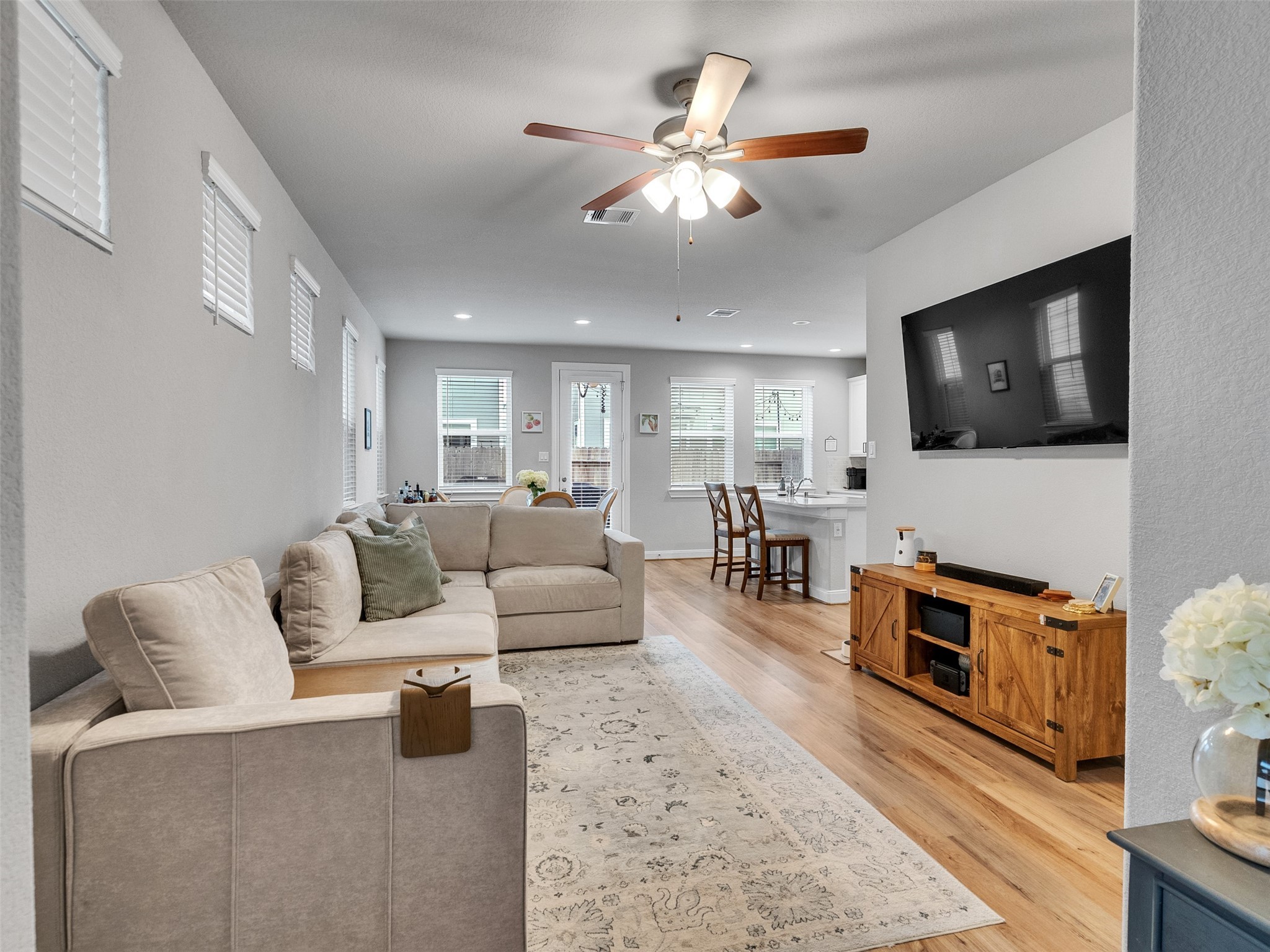 3118 Cloud Forest Lane Houston, TX 77080 - Photo 18 of 40 a living room with furniture and a flat screen tv