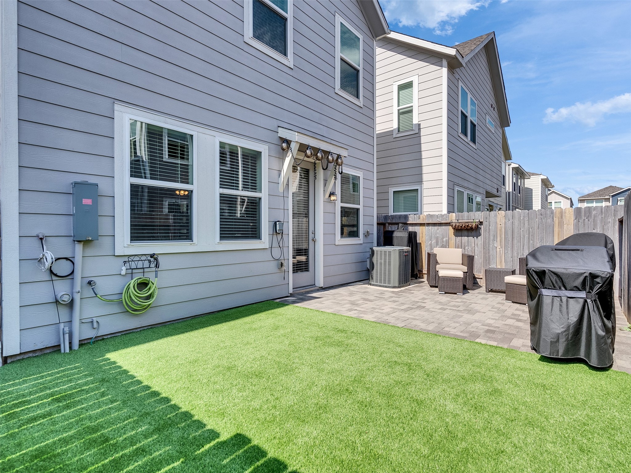 3118 Cloud Forest Lane Houston, TX 77080 - Photo 33 of 40 a front view of a house with patio and garden