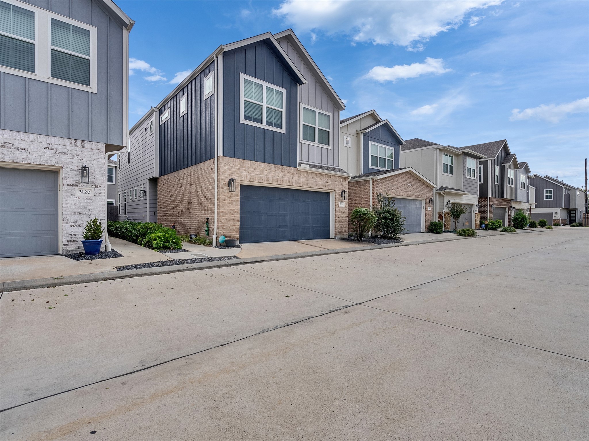 3118 Cloud Forest Lane Houston, TX 77080 - Photo 4 of 40 a front view of a house with a yard and garage