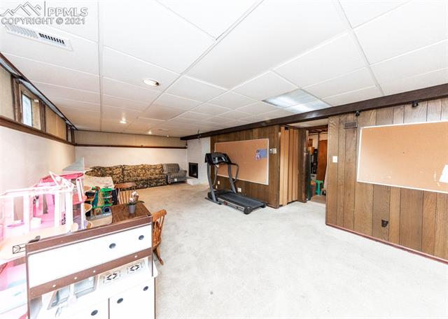 2208 North Chelton Road Colorado Springs, CO 80909 - Photo 20 of 24 HUGE basement family room. This could be a theater room, a home gym, or anything your heart desires!