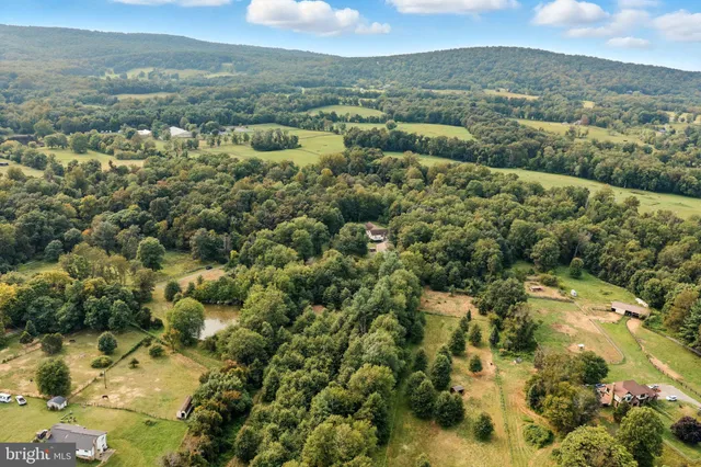 a view of a city with mountains in the background
