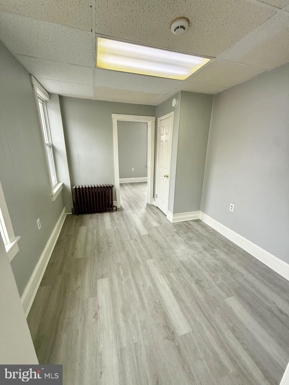 145 Spring Valley Road Reading, PA 19605 - Photo 21 of 44 a view of empty room with wooden floor