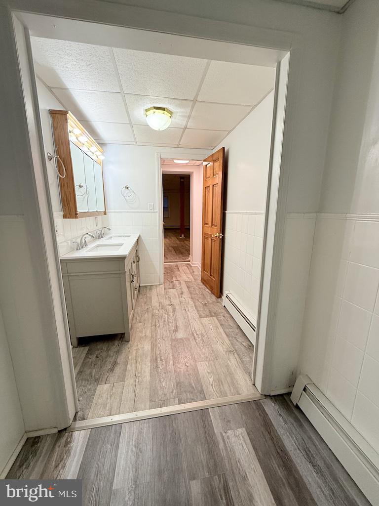 145 Spring Valley Road Reading, PA 19605 - Photo 29 of 44 a view of a hallway with wooden floor and staircase
