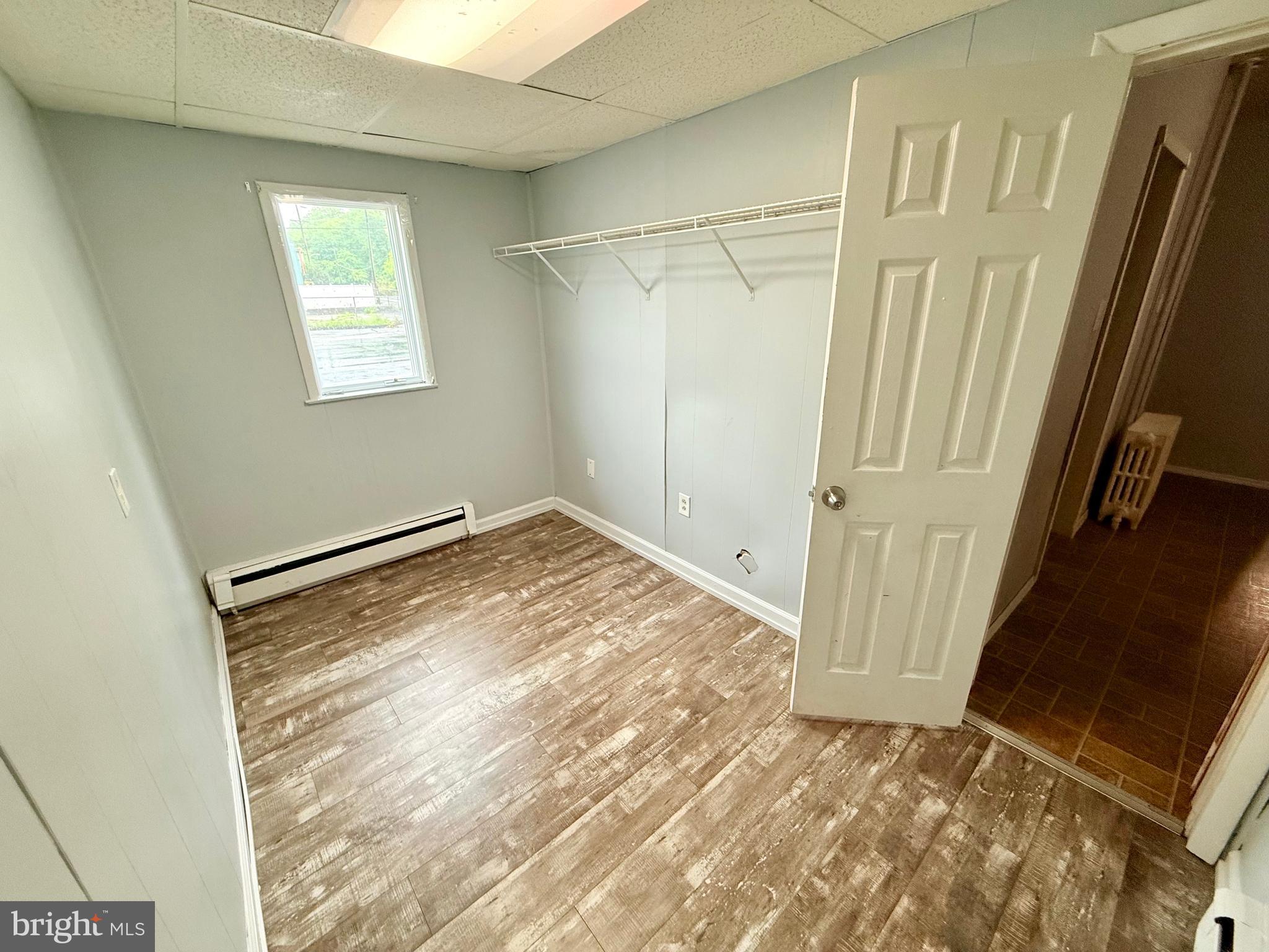 145 Spring Valley Road Reading, PA 19605 - Photo 43 of 44 a view of empty room with wooden floor and fan