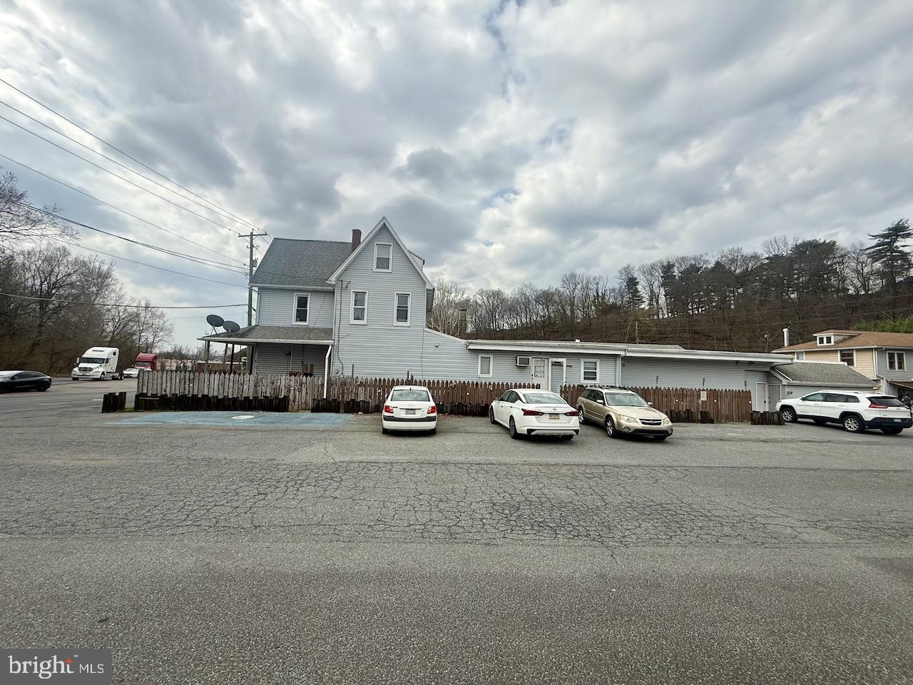 145 Spring Valley Road Reading, PA 19605 - Photo 5 of 44 a view of street with parked cars