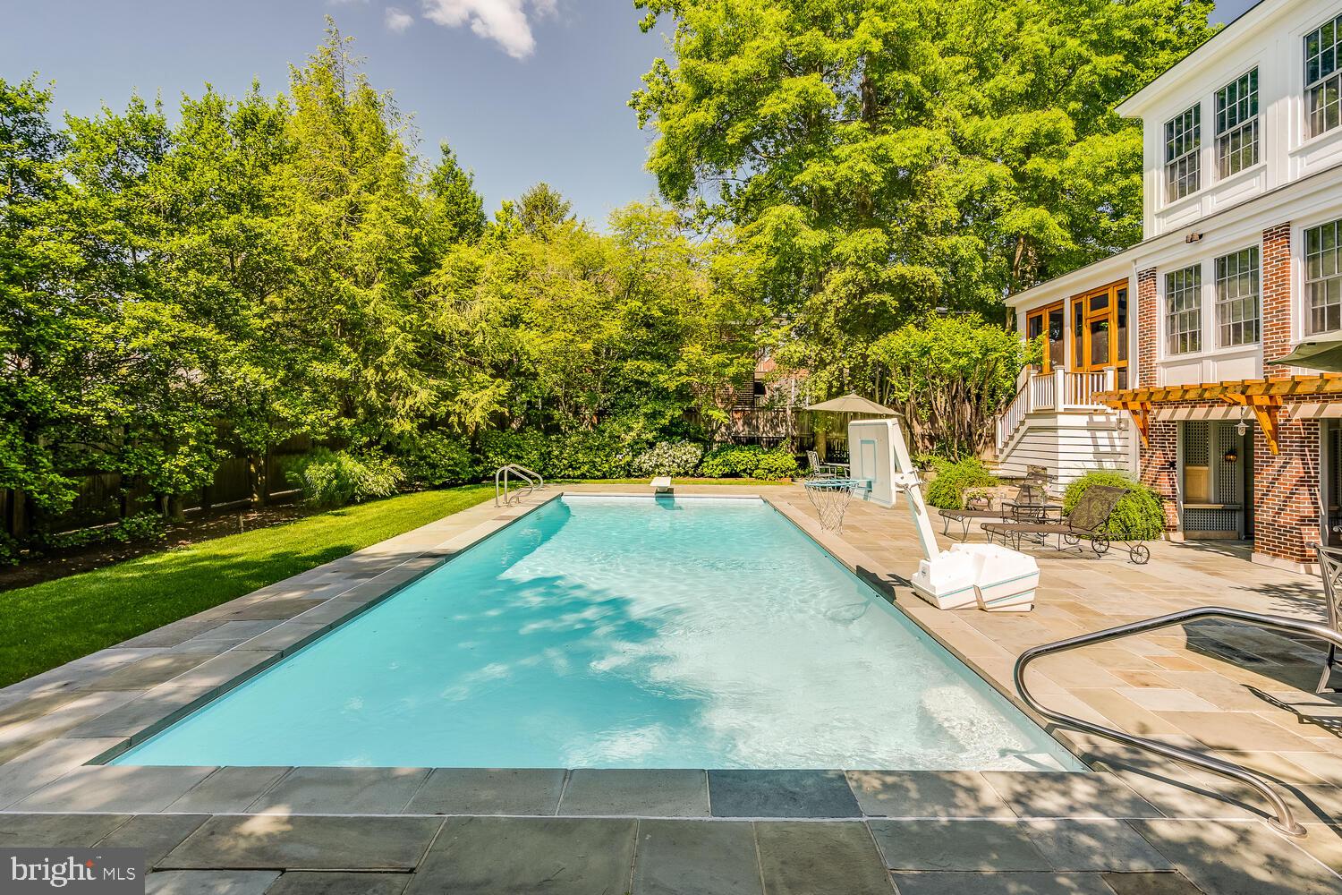 3512 Rittenhouse Street Northwest Washington, DC 20015 - Photo 114 of 132 a view of a swimming pool with a lounge chairs