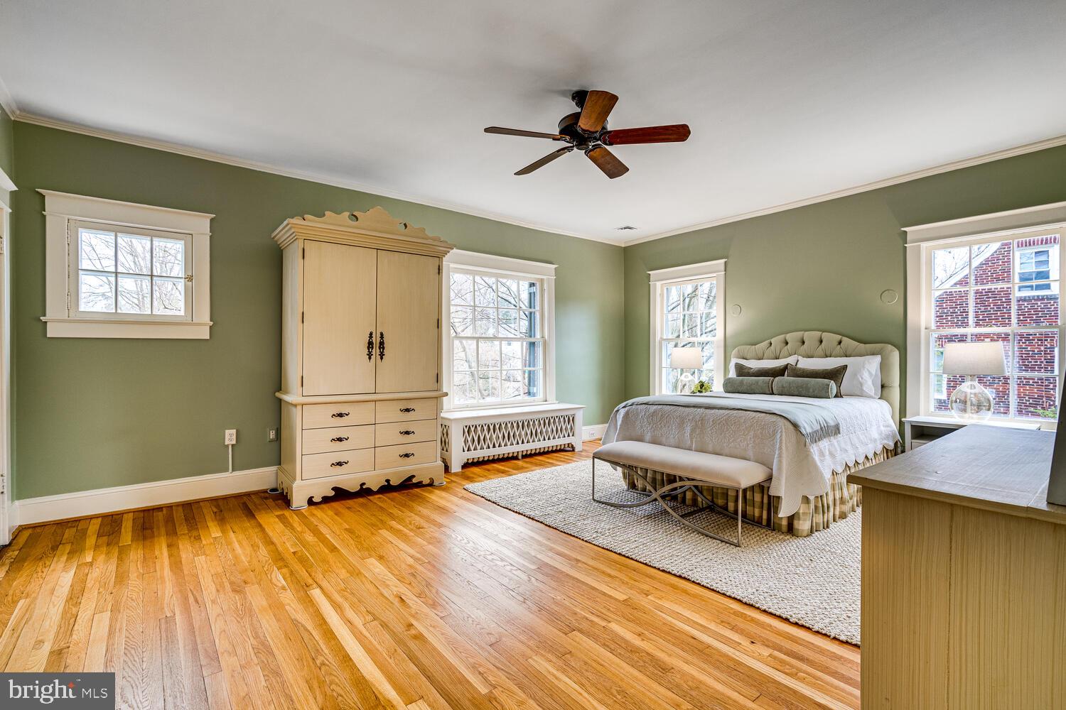 3512 Rittenhouse Street Northwest Washington, DC 20015 - Photo 12 of 132 a bedroom with a bed and wooden floor