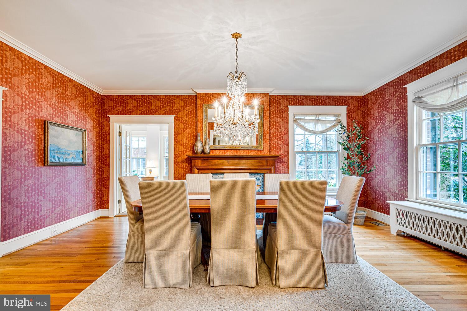 3512 Rittenhouse Street Northwest Washington, DC 20015 - Photo 21 of 132 a dining room with furniture a chandelier and wooden floor