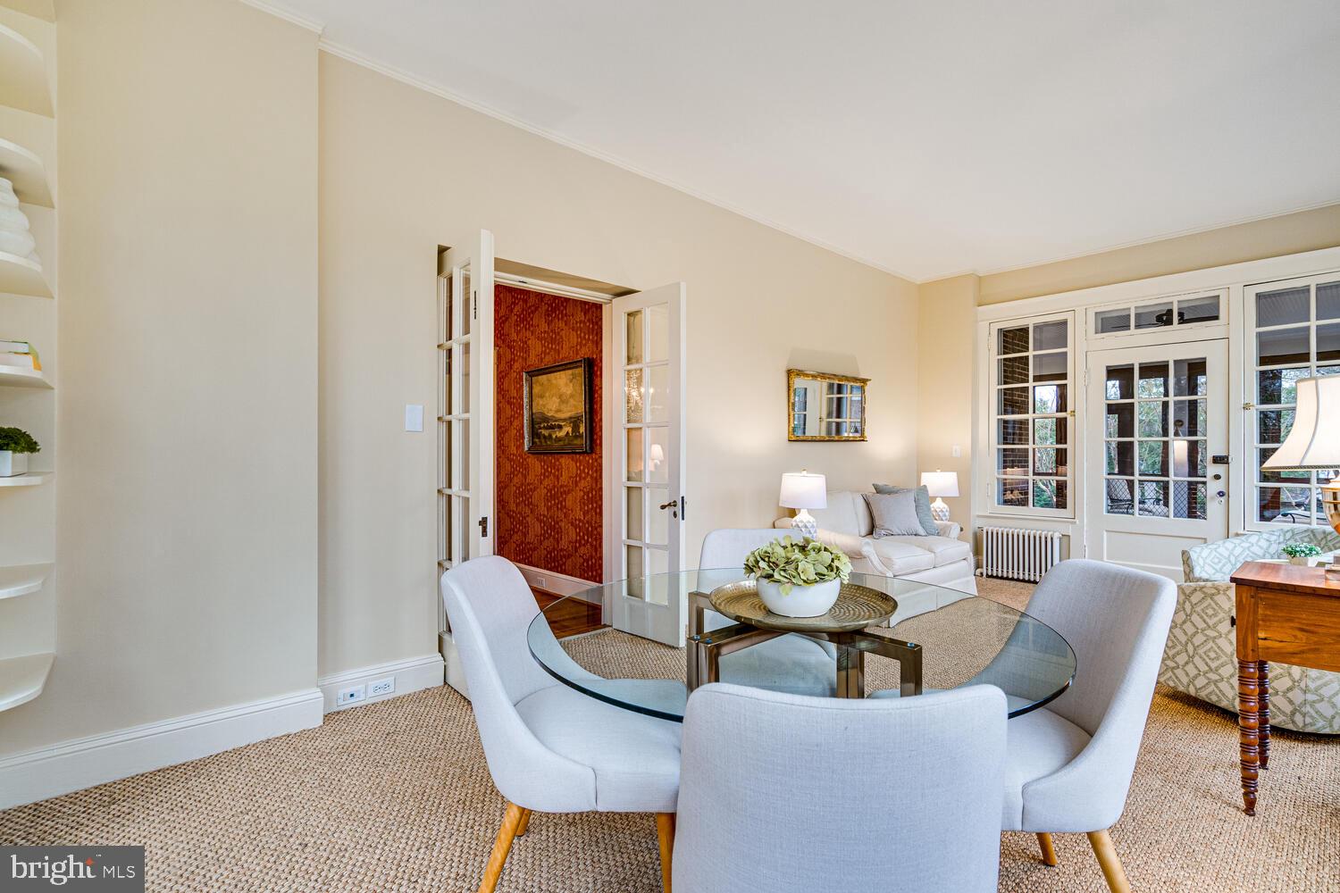 3512 Rittenhouse Street Northwest Washington, DC 20015 - Photo 25 of 132 a dining room with furniture a rug and wooden floor