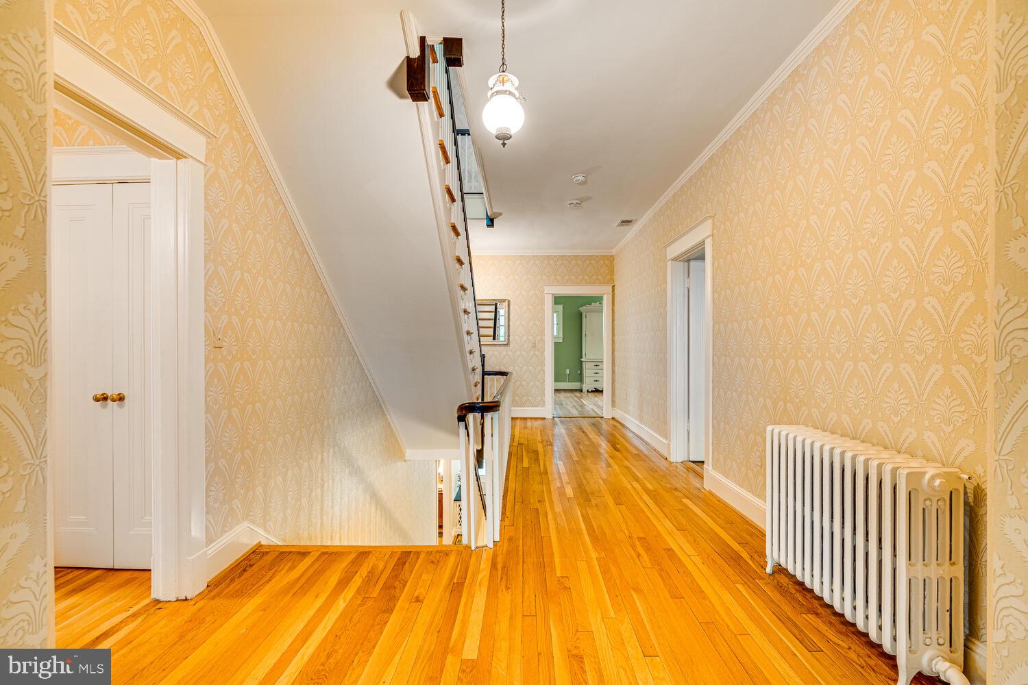 3512 Rittenhouse Street Northwest Washington, DC 20015 - Photo 45 of 132 a view of a room with wooden floor and staircase