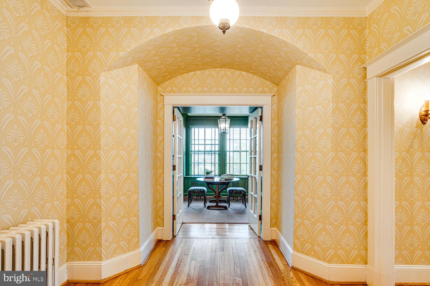 3512 Rittenhouse Street Northwest Washington, DC 20015 - Photo 46 of 132 a view of a hallway with wooden floor and a bathroom