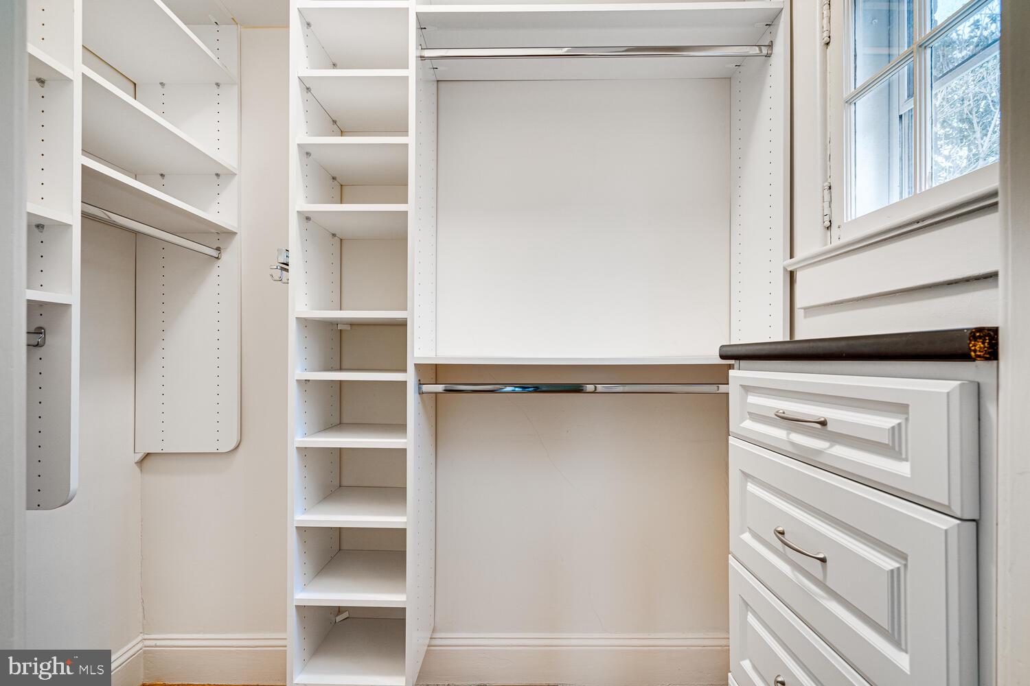 3512 Rittenhouse Street Northwest Washington, DC 20015 - Photo 57 of 132 a view of walk in closet with empty racks