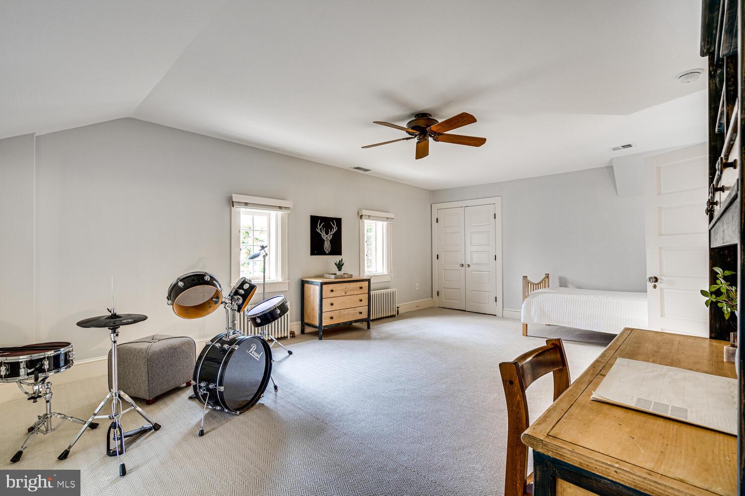 3512 Rittenhouse Street Northwest Washington, DC 20015 - Photo 80 of 132 a living room with furniture and a flat screen tv