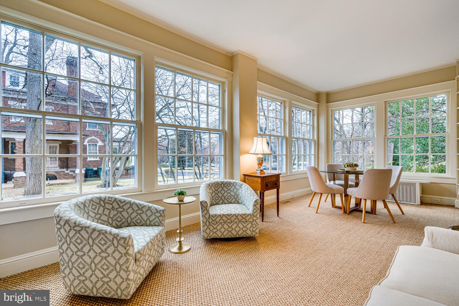 3512 Rittenhouse Street Northwest Washington, DC 20015 - Photo 8 of 132 a living room with furniture and floor to ceiling windows
