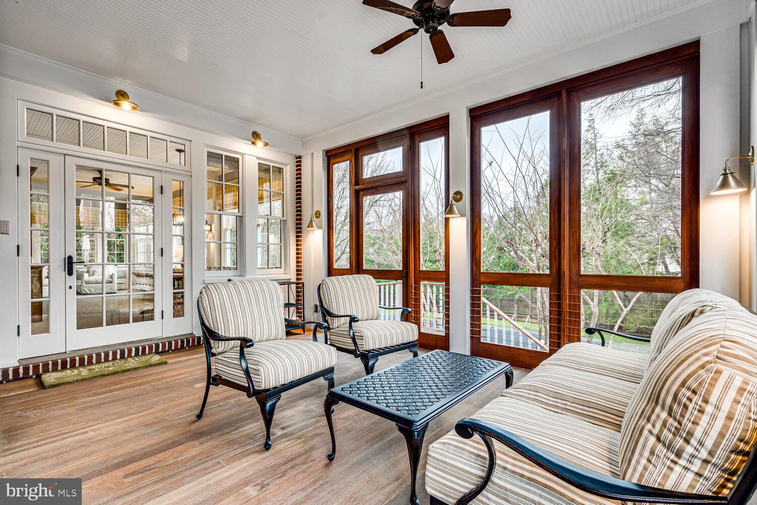 3512 Rittenhouse Street Northwest Washington, DC 20015 - Photo 9 of 132 a living room with furniture and a floor to ceiling window