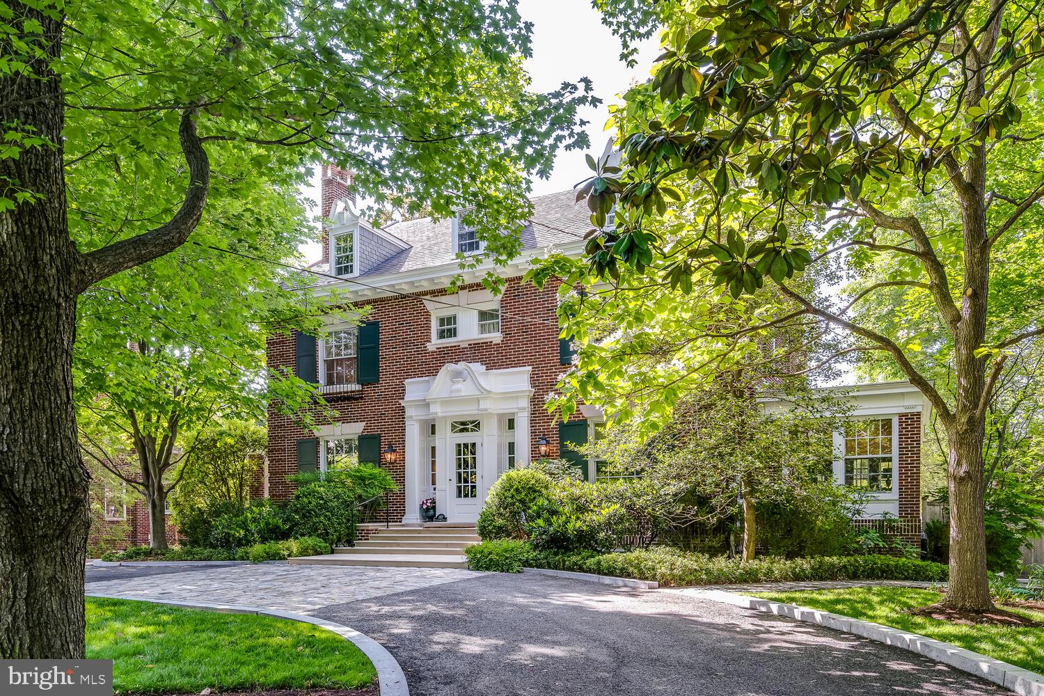 3512 Rittenhouse Street Northwest Washington, DC 20015 - Photo 99 of 132 a front view of a house with a yard