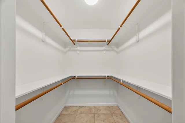 a view of a room with racks on the wall