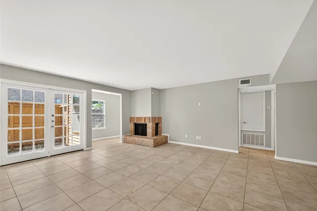 an empty room with windows