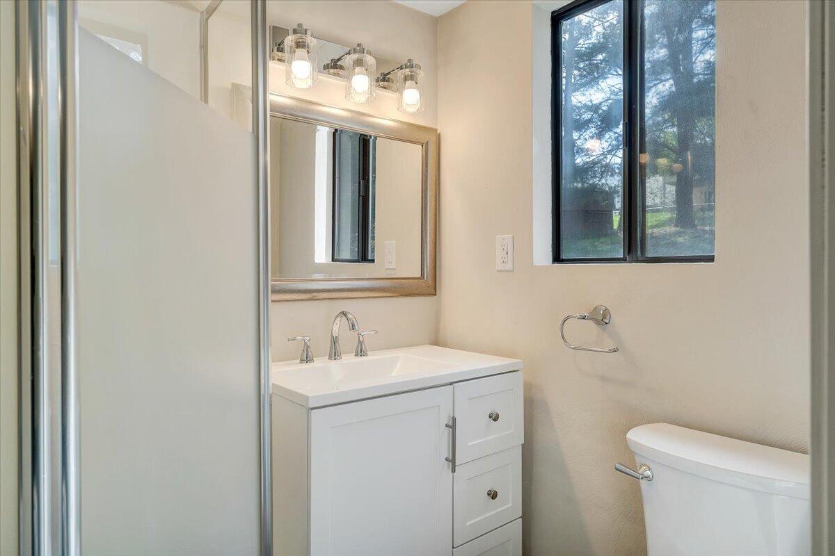 2159 Beavers Lane Vinton, VA 24179 - Photo 28 of 45 a bathroom with a toilet sink and mirror