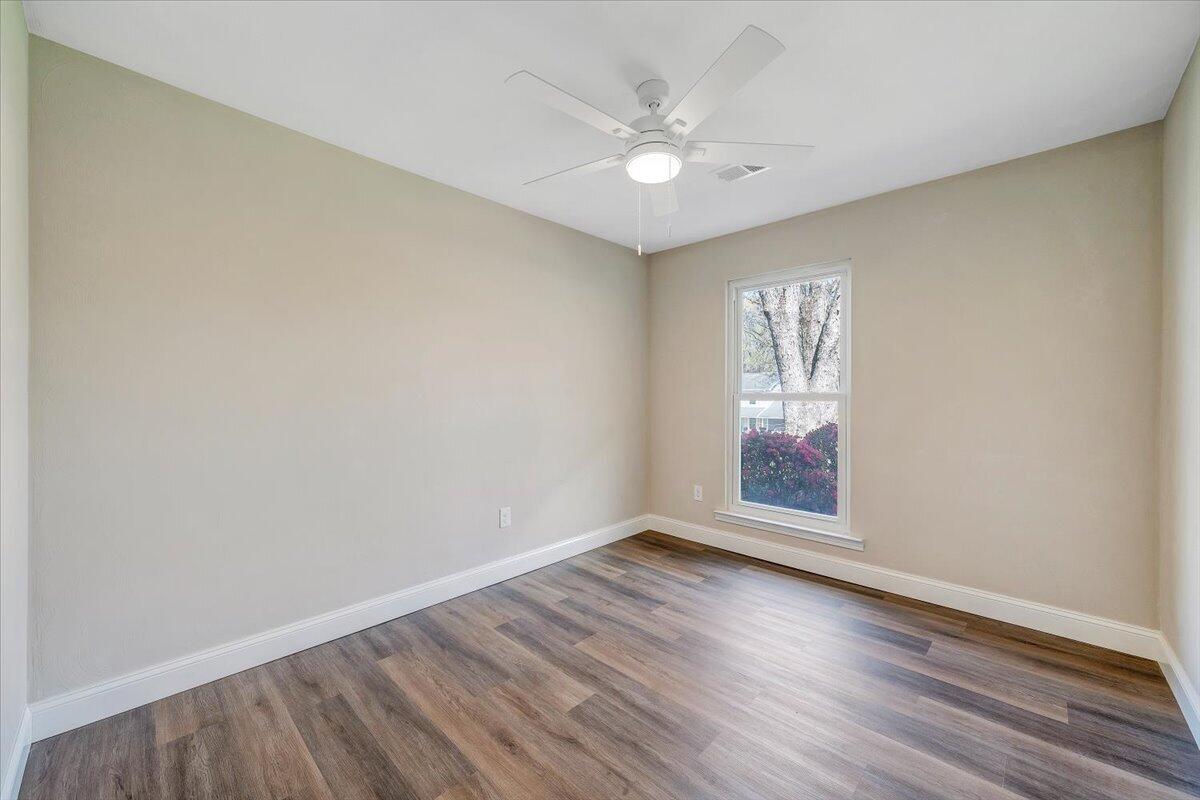 2159 Beavers Lane Vinton, VA 24179 - Photo 33 of 45 an empty room with wooden floor and windows