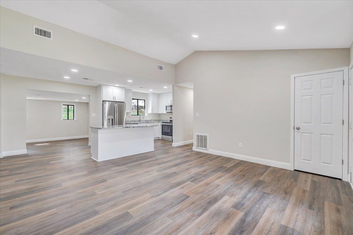2159 Beavers Lane Vinton, VA 24179 - Photo 4 of 45 a view of kitchen with wooden floor and windows