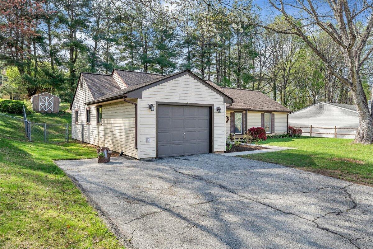 2159 Beavers Lane Vinton, VA 24179 - Photo 42 of 45 a front view of a house with a yard and garage