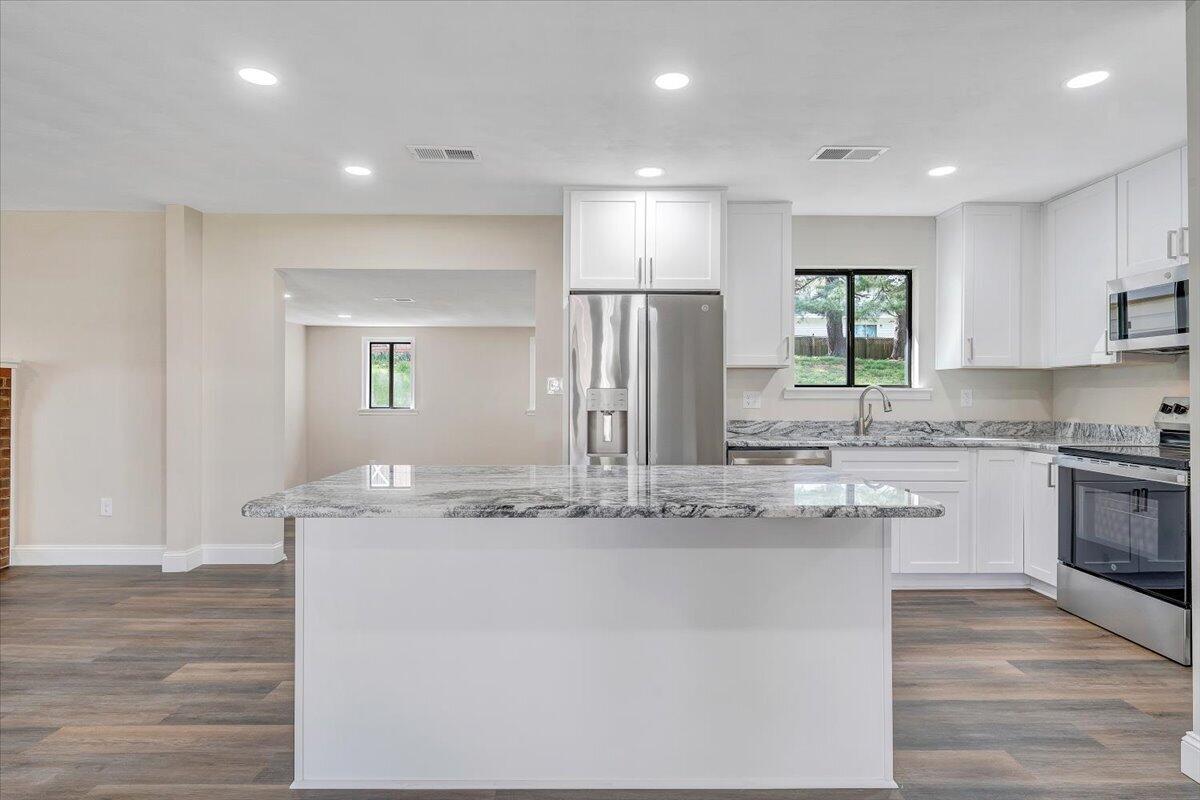 2159 Beavers Lane Vinton, VA 24179 - Photo 7 of 45 a kitchen with stainless steel appliances granite countertop a sink and cabinets