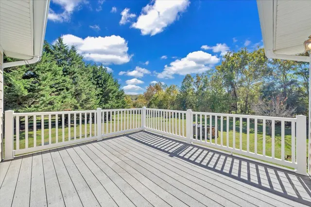 a view of a bathroom with a sink and mirror