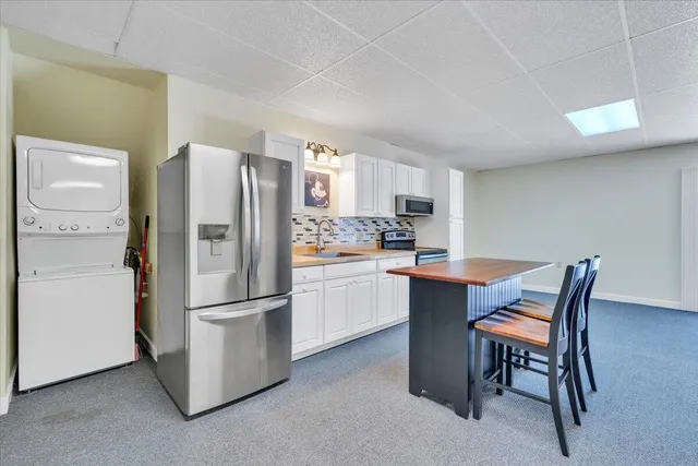 a view of house with outdoor space and entertaining space