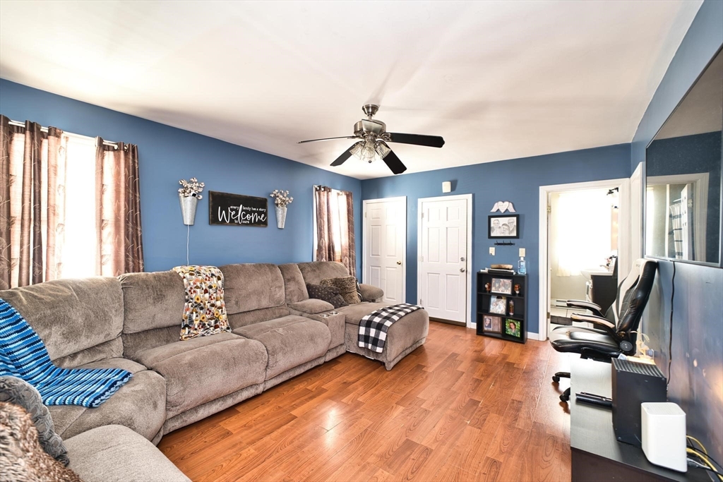 232 Alden Street Fall River, MA 02723 - Photo 17 of 34 a living room with furniture flat screen tv and a large window