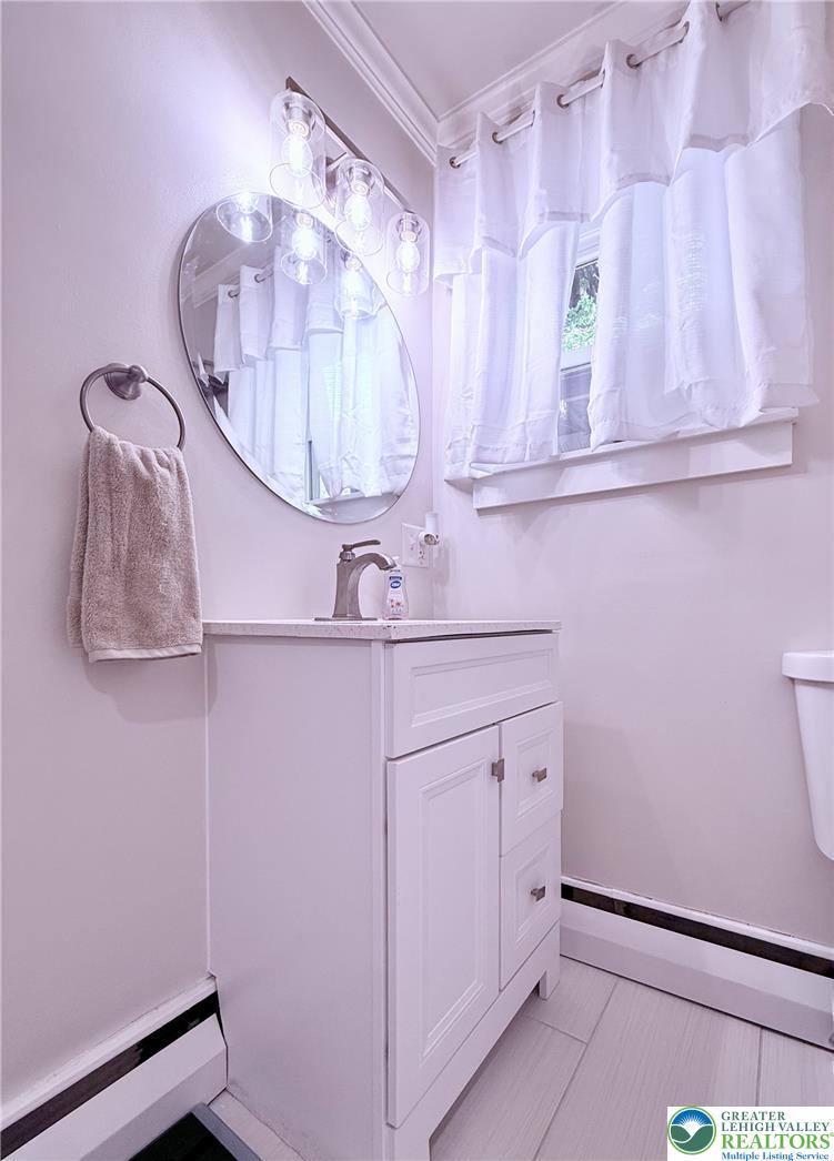 1275 Macada Road Bethlehem, PA 18017 - Photo 49 of 87 a bathroom with a sink a mirror and a shower