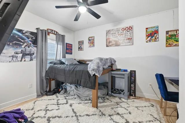 a bedroom with furniture and a bed