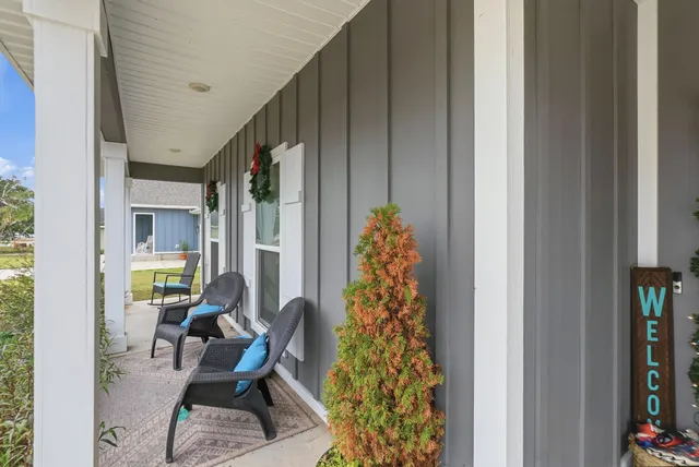 a view of balcony with furniture