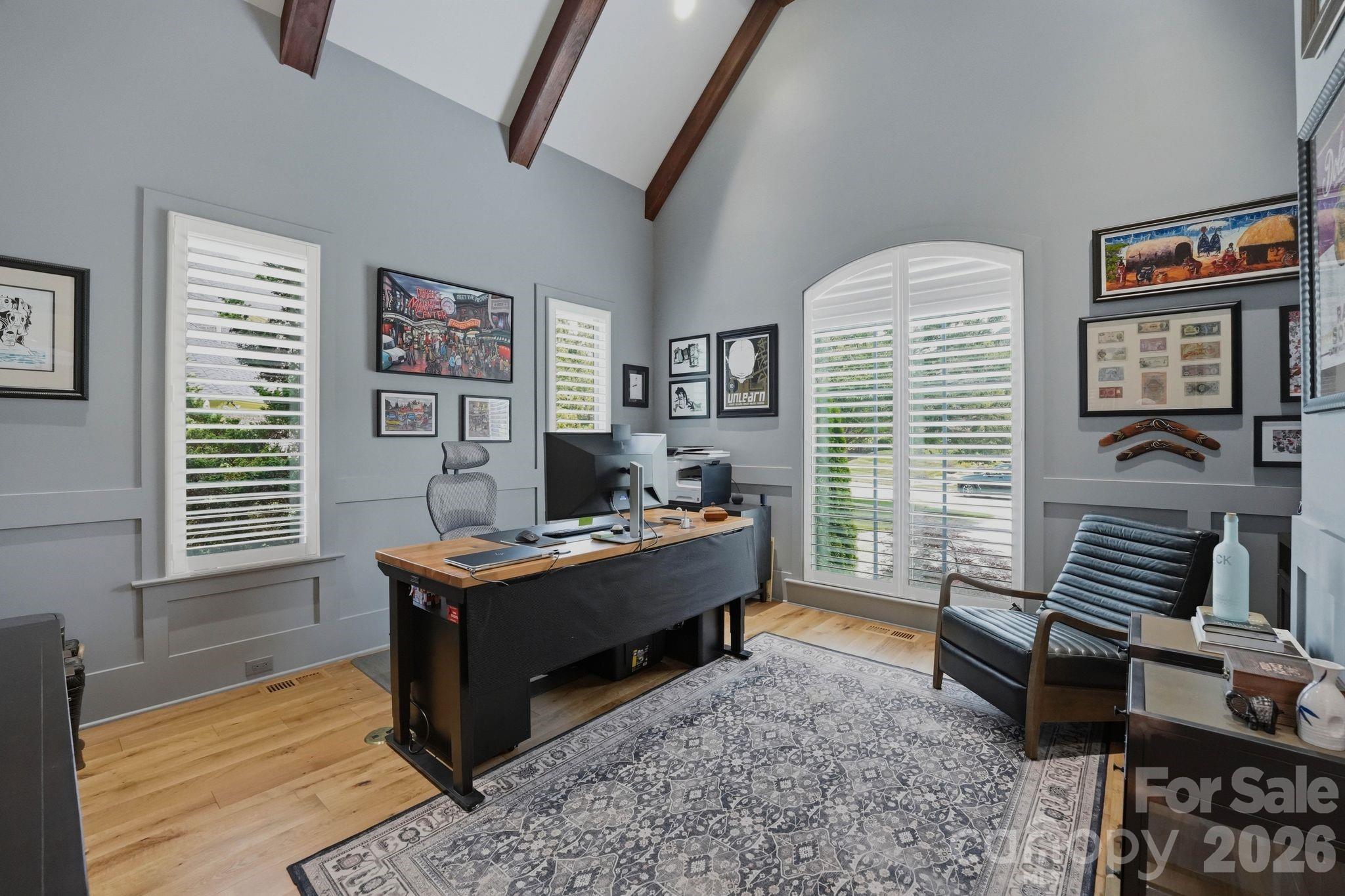 7416 Lee Rea Road Charlotte, NC 28226 - Photo 22 of 48 a view of a workspace with furniture and a window