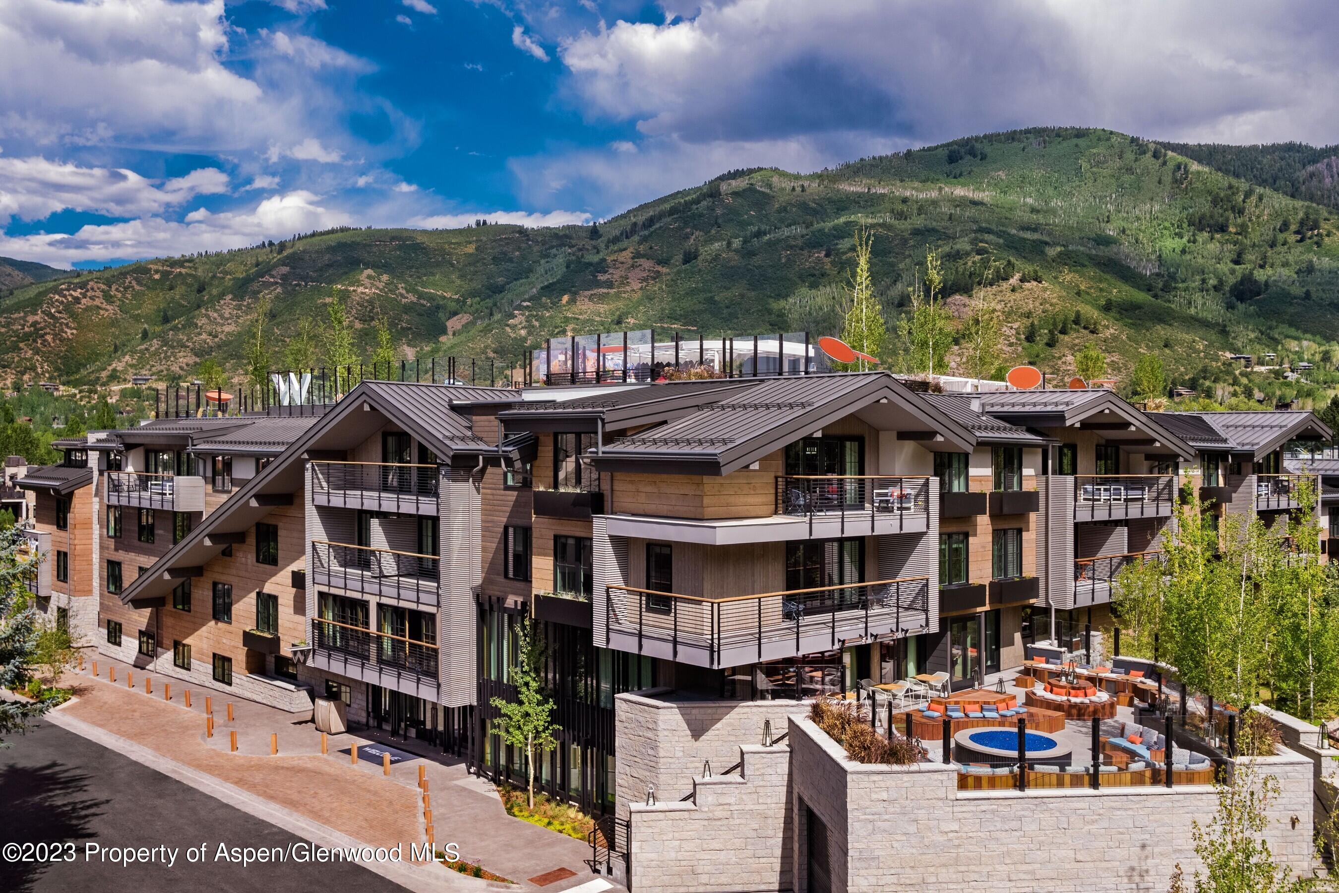 550 South Spring Street, Unit F10 110 Aspen, CO 81611 - Photo 56 of 58 a view of multiple houses with a street