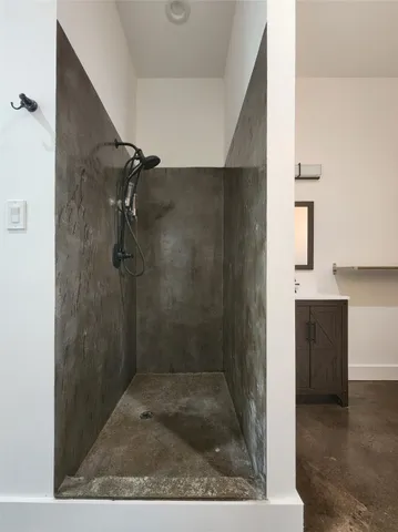 a white bath tub sitting in a bathroom