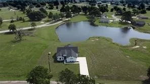 a view of a house with a big yard